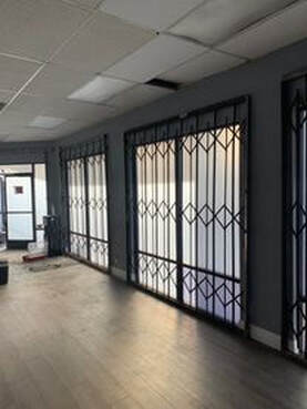 Metal Commercial Folding Gate Lynwood Picture